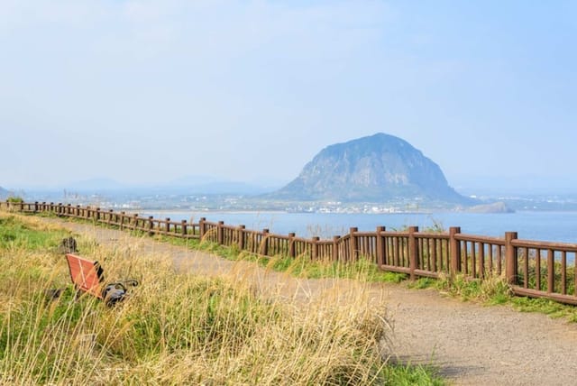 Jeju Island Sightseeing Tour | Jungmun Tourist Complex Tour: Halla Arboretum + Cheonjeyeon Falls + Yakcheonsa Temple | Japanese guide, Jeju City hotel pick-up and drop-off, lunch included - Photo 1 of 9